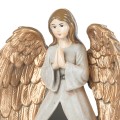 Zbliżenie twarzy, złożonych dłoni i złocistych skrzydeł anioła Favola